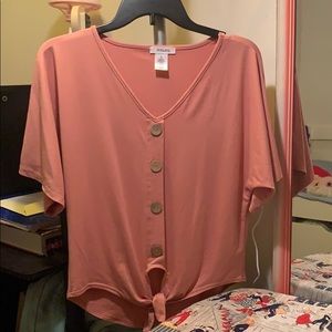 A cute light pink tie front buttoned rip-knit top.